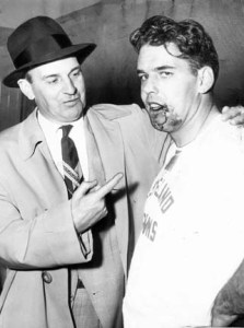 PDHST Plain Dealer Historical Photographic Collection - Cleveland Browns - Hall of Fame - Coach Paul Brown with quarterback Otto Graham in the dressingroom after a game on Nov. 15, 1953, against the San Francisco 49ers. The Browns won 23-21. "Just think it could have been his ankle," Brown quipped. Cleveland News photo by George Hixon, staff photographer