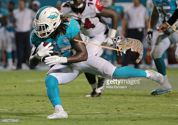 during a preseason game at Sun Life Stadium on August 29, 2015 in Miami Gardens, Florida.